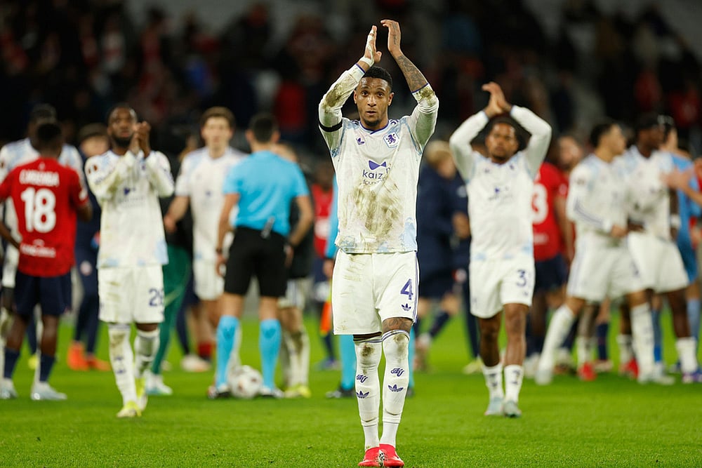 Aston Villa's Ezri Konsa reacts after a first leg, round of 16 Europa League soccer match between Lille and Aston Villa in Lille, France. - | Photo: AP/Jean-Francois Badias