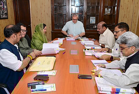 Jammu and Kashmir Chief Minister Omar Abdullah, centre, with Deputy CM Surinder Kumar Choudhary, and others, during a Cabinet meeting, in Jammu. 