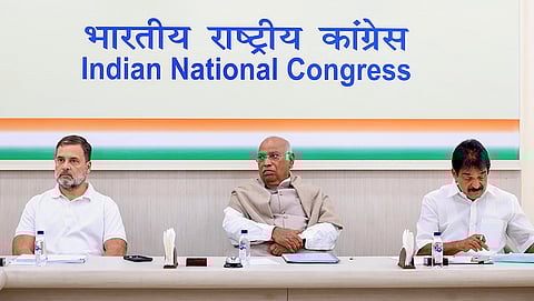 Congress President and LoP in the Rajya Sabha Mallikarjun Kharge, centre, with LoP in the Lok Sabha Rahul Gandhi, left, and party MP KC Venugopal during a Congress Central Election Committee (CEC) meeting for Assam, in New Delhi. 