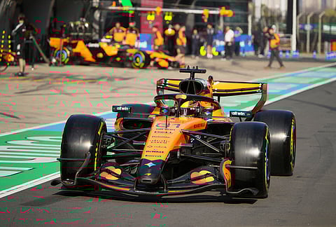 McLaren driver Oscar Piastri of Australia waits after steering his car out of the garage during the sprint qualifying ahead of the Chinese Formula One Grand Prix, in Shanghai, China.