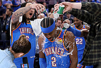 | Photo: AP/Nate Billings : Oklahoma City Thunder forward Jaylin Williams, left, and other Thunder players pour water on Thunder guard Shai Gilgeous-Alexander (2) after an NBA basketball game against the Boston Celtics in Oklahoma City. 