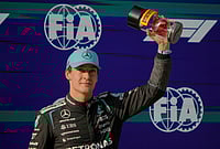 | Photo: AP/Andy Wong : Mercedes driver George Russell of Britain celebrates his pole position for the sprint qualifying ahead of the Chinese Formula One Grand Prix race in Shanghai, China.