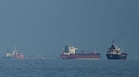 Credit: AP Photo/ Altaf Qadri | Representative Image : Oil tankers and cargo ships line up in the Strait of Hormuz as seen from Khor Fakkan, United Arab Emirates, Wednesday, March 11, 2026