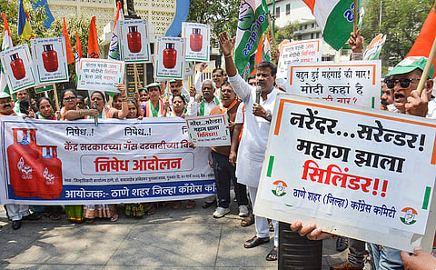 Congress workers stage a protest over LPG shortage and rising prices, in Thane. The party alleged that the shortage was due to the policies of the central government and demanded smooth supply of LPG cylinders. 