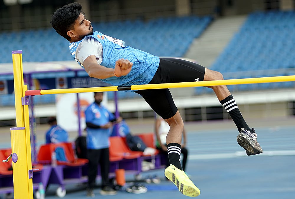 India's Shailesh Kumar competes in the Men's High Jump T42 event during the World Para Athletics Grand Prix 2026 at Jawaharlal Nehru Stadium, in New Delhi. - | Photo: PTI
