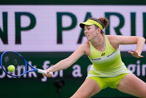 Linda Noskova, of the Czech Republic, returns a shot against Aryna Sabalenka, of Belarus, during a semifinal match at the BNP Paribas Open tennis tournament, in Indian Wells, California.