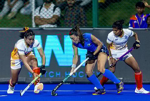 Italy's Emilia Munitis and India's Manisha Chouhan in action during their FIH Women's Hockey World Cup Qualifiers match on March 13, 2026