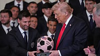 Is Donald Trump Using Sports, Lionel Messi, And Cristiano Ronaldo To Boost His Political Clout? Photo: AP/Julia Demaree Nikhinson : President Donald Trump receives a soccer ball trophy from Lionel Messi during an event to honor the 2025 Major League Soccer champions Inter Miami in the East Room of the White House in Washington.