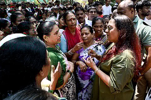 Members of the Koli fishing community and Cuffe Parade Residents Association (CPRA) during a protest against coastal encroachment, illegal land reclamation and mangrove destruction, in Mumbai.