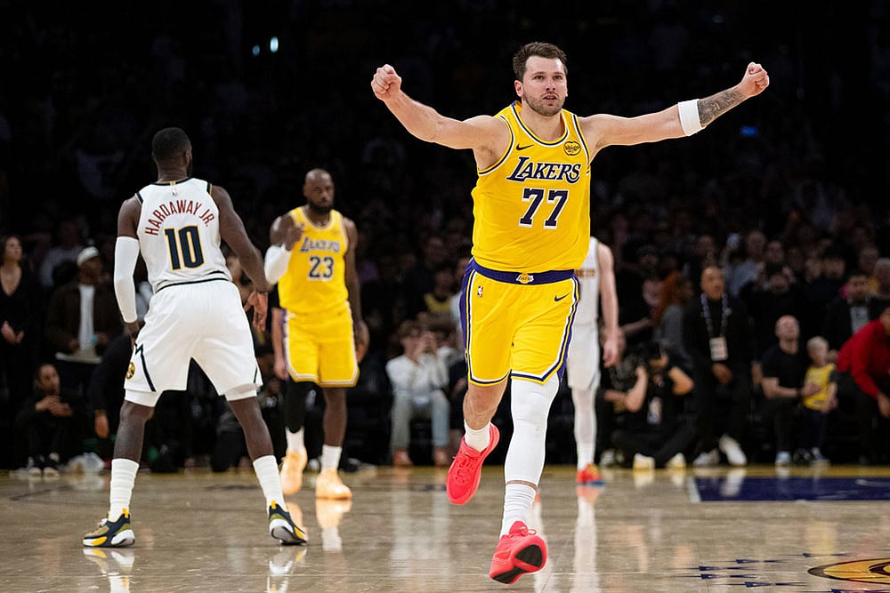 | Photo: AP/Kyusung Gong : Los Angeles Lakers guard Luka Doncic (77) gestures after the team defeats the Denver Nuggets in an NBA basketball game in Los Angeles.