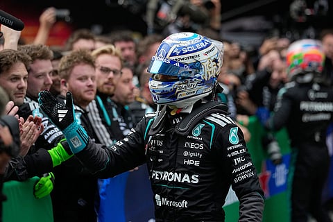 Mercedes driver Andrea Kimi Antonelli of Italy celebrates after he clocked the fastest time to win the Chinese Formula One Grand Prix race at the Shanghai International Circuit, in Shanghai, China.