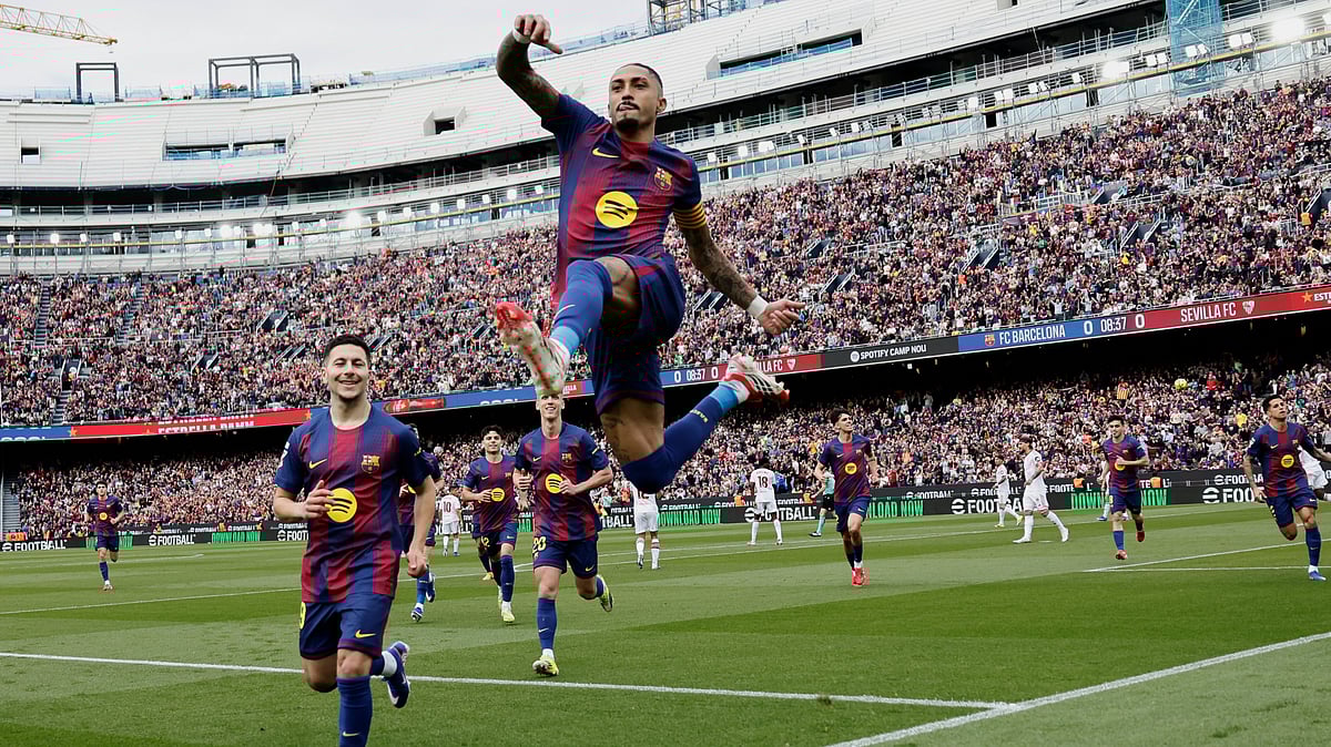 Barcelona's Raphinha celebrates after scoring his side's opening goal during the Spanish La Liga soccer match between Barcelona and Sevilla in Barcelona, Spain, Sunday, March 15, 2026. - | Photo: AP/Joan Monfort