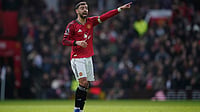 English Premier League Matchday 30 Roundup: Bruno Fernandes Inspires Manchester United; Spurs Deny Liverpool Late | Photo: AP/Dave Thompson : Manchester United's Bruno Fernandes reacts during the Premiier League soccer match between Manchester United and Aston Villa in Manchester, England, Sunday, March 15, 2026.