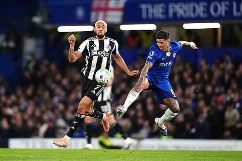Newcastle United's Joelinton, left, and Chelsea's Enzo Fernandez battle for the ball during the Premier League match between Chelsea and Newcastle, in London.