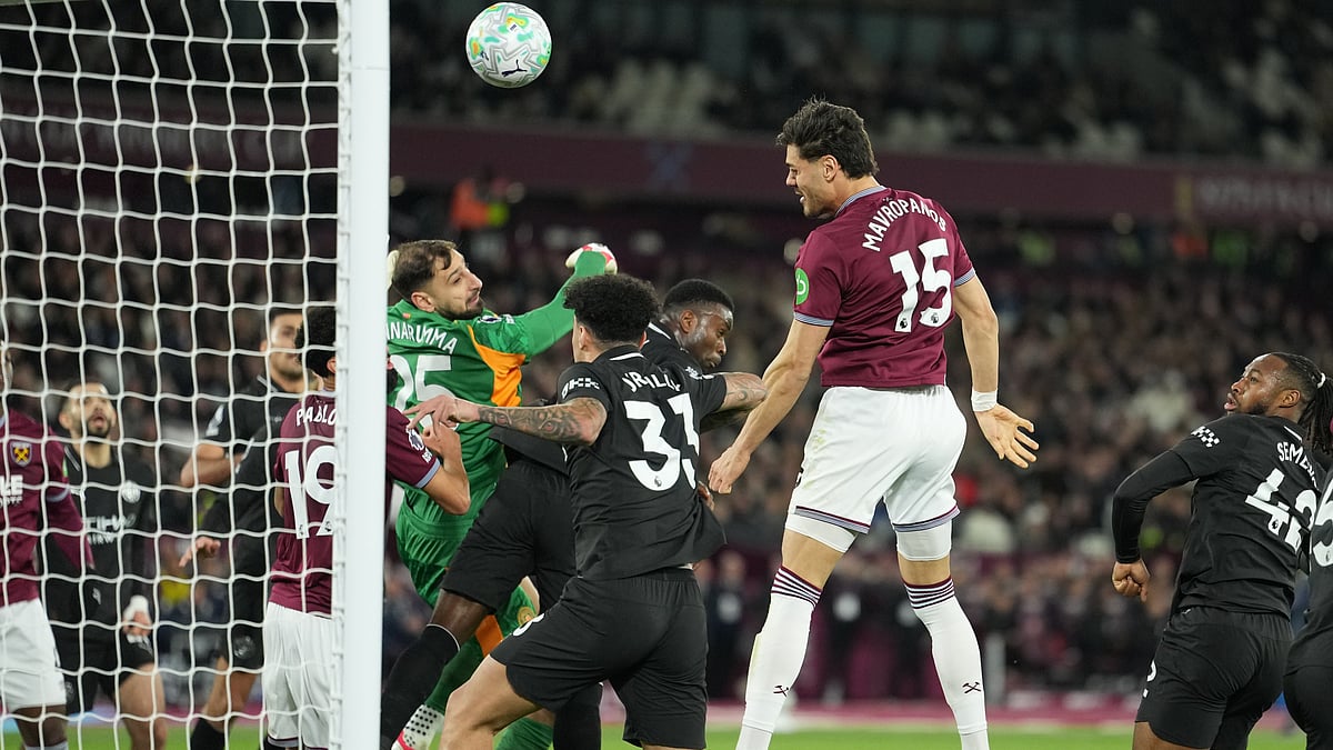 Konstantinos Mavropanos (15) scores his side's first goal during the English Premier League soccer match between West Ham United and Manchester City in London. - AP/Dave Shopland