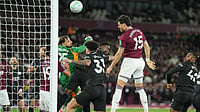 AP/Dave Shopland : Konstantinos Mavropanos (15) scores his side's first goal during the English Premier League soccer match between West Ham United and Manchester City in London.