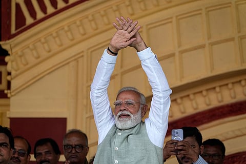 Prime Minister Narendra Modi of Bharatiya Janata Party, BJP, greets the audience during a public meeting in Kolkata, India.