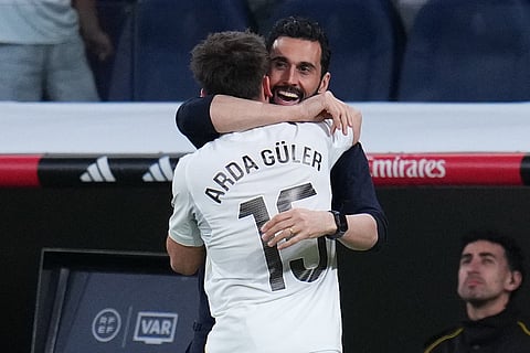 Real Madrid's Arda Guler celebrates with Real Madrid's head coach Alvaro Arbeloa after scoring his side's fourth goal during a Spanish La Liga soccer match between Real Madrid and Elche CF, in Madrid.