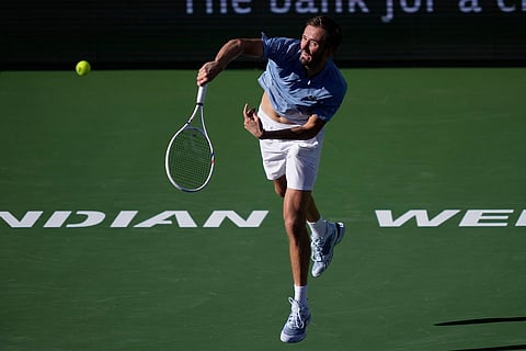 Daniil Medvedev, of Russia, serves against Carlos Alcaraz, of Spain, during a semifinal match at the BNP Paribas Open tennis tournament in Indian Wells, Calif.