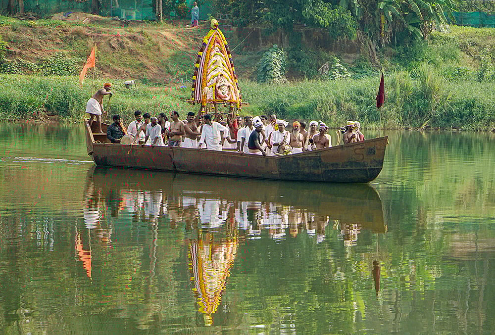 Sacred articles ferried across Phalguni River after temple ceremony in Mangaluru