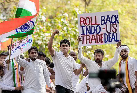 Indian Youth Congress national president Uday Bhanu Chib, center, along with party workers during a protest against the India-US trade deal at Jantar Mantar, in New Delhi.