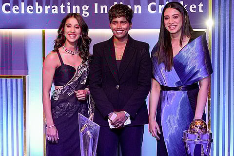 From left, Indian women's cricket team players Jemimah Rodrigues, Arundhati Reddy and Smriti Mandhana during the BCCI Naman Awards 2026, in New Delhi.