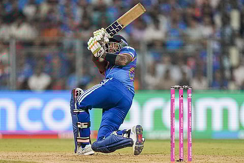 India's captain Suryakumar Yadav plays a shot during the ICC Men's T20 World Cup 2026 cricket match between India and USA, at the Wankhede Stadium, in Mumbai.
