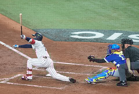 Japan's Shota Morishita hits three run home run during the third inning of a World Baseball Classic quarterfinal game in Miami. 