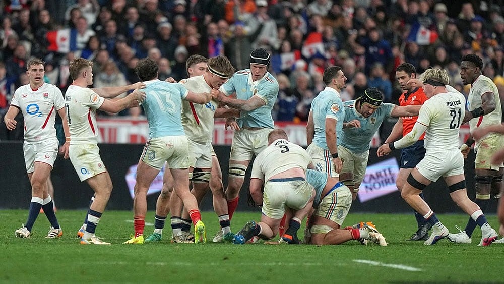 Players clash during the Six Nations rugby union match between France and England in Saint-Denis, outside Paris. - | Photo: AP/Michel Euler
