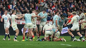 | Photo: AP/Michel Euler : Players clash during the Six Nations rugby union match between France and England in Saint-Denis, outside Paris.
