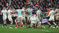 From Carpetgate To BOD 2014: Revisiting Unforgettable Six Nations Last-Day Title Fights | Photo: AP/Michel Euler : Players clash during the Six Nations rugby union match between France and England in Saint-Denis, outside Paris.