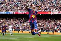 Barcelona 5-2 Sevilla, La Liga 2025-26: Raphinha Hat-Trick Seals Blaugrana Win | Photo: AP/Joan Monfort : Barcelona's Raphinha celebrates after scoring during the Spanish La Liga soccer match between Barcelona and Sevilla in Barcelona, Spain