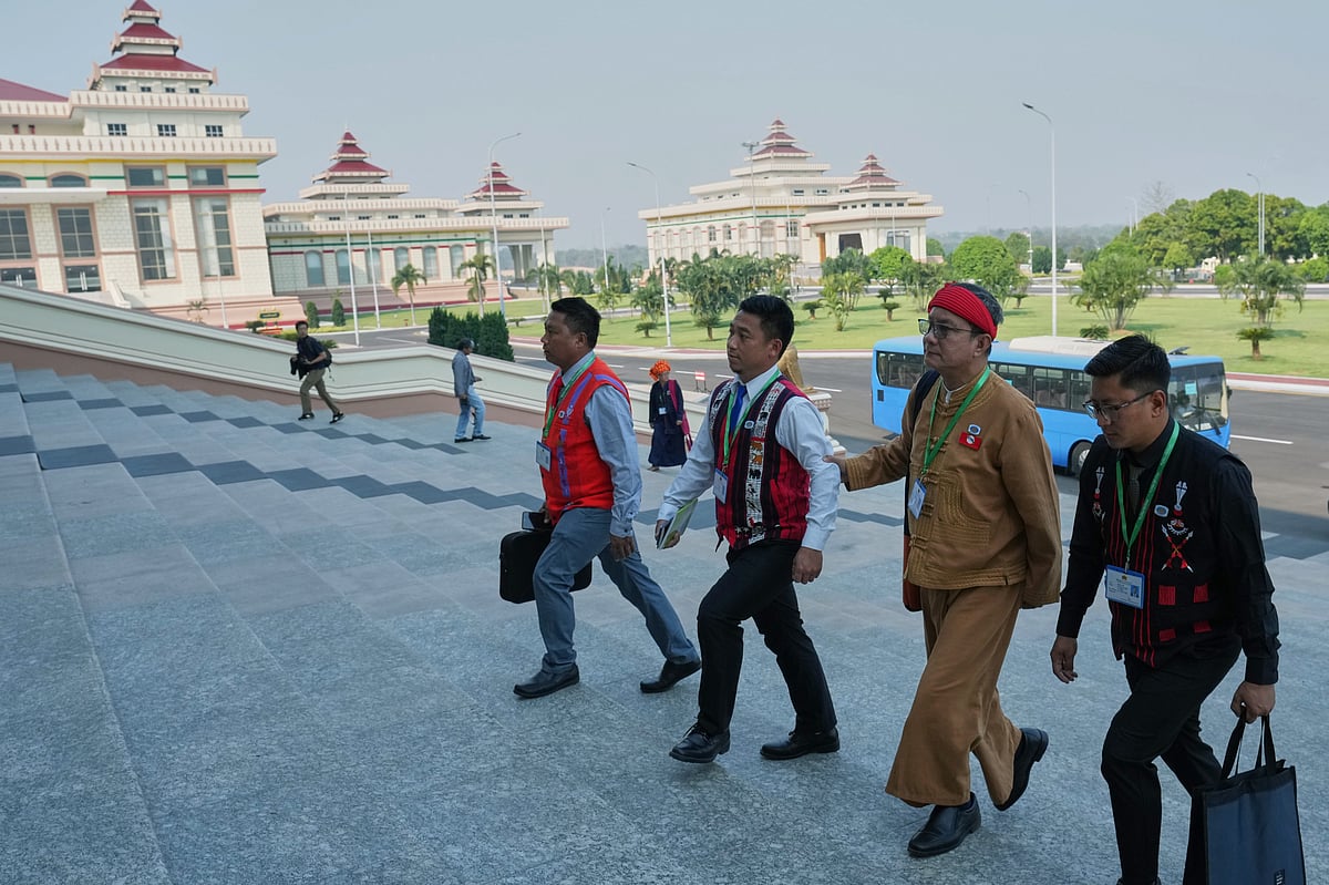 Myanmar lawmakers arrive to attend a session at Lower House parliament in Naypyitaw, Myanmar, Monday, March 16, 2026. - Aung Shine Oo
