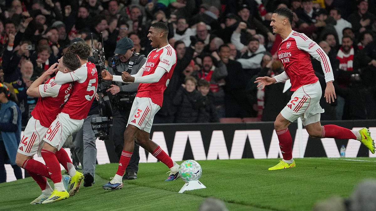Arsenal players celebrate after a goal during the English Premier League soccer match between Arsenal and Everton in London, England, Saturday, March 14, 2026. - | Photo: AP/Kin Cheung