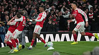 | Photo: AP/Kin Cheung : Arsenal players celebrate after a goal during the English Premier League soccer match between Arsenal and Everton in London, England, Saturday, March 14, 2026.