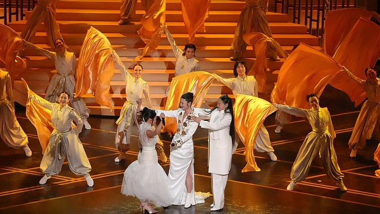 Rei Ami, from left, EJAE, and Audrey Nuna perform 'Golden' from "K-Pop Demon Hunters" during the Oscars on Sunday, March 15, 2026, at the Dolby Theatre in Los Angeles. - AP Photo/Chris Pizzello