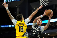 | Photo: AP/Aaron Gash : Milwaukee Bucks' Ryan Rollins (13) shoots against Indiana Pacers' Jalen Slawson (18) during the second half of an NBA basketball game in Milwaukee.