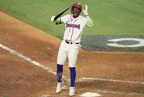 Dominican Republic Geraldo Perdomo reacts after striking out at the end of the ninth inning of a World Baseball Classic semifinal game against the United States, in Miami.