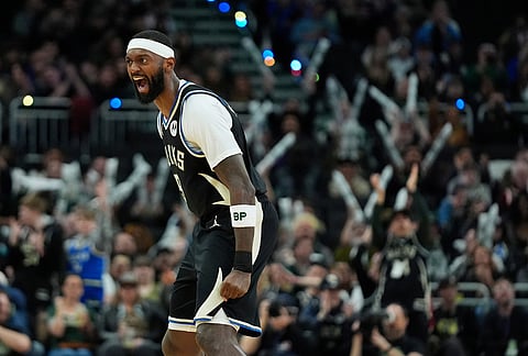 Milwaukee Bucks' Bobby Portis reacts during the second half of an NBA basketball game against the Indiana Pacers, in Milwaukee.