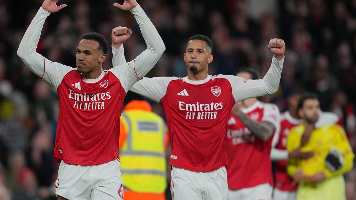 Arsenal's Gabriel, left, and William Saliba celebrate after the English Premier League soccer match between Arsenal and Everton in London, England, Saturday, March 14, 2026.  - | Photo: AP/Kin Cheung