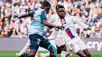 Ligue 1 Matchday 26 Roundup: Lyon Held By 10‑Man Le Havre To Extend Winless Run; Lille Close Gap On Top Three | Photo: X/HAC_Foot : Le Havre's Lucas Gourna-Douath tussles with the ball with Lyon's Moussa Niakhite during their Ligue 1 match on March 15, 2026.