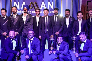| Photo: PTI/Kamal Kishore : Indian men's cricket team captain Suryakumar Yadav with teammates during the BCCI Naman Awards 2026, in New Delhi.