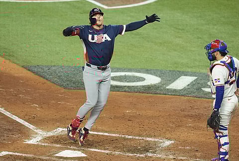 United States' Gunnar Henderson celebrates after hitting a home run during the fourth inning of a World Baseball Classic semifinal game against the Dominican Republic, in Miami. 