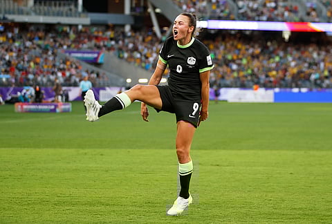 Australia's Caitlin Foord celebrates after scoring her team's first goal during the Women's Asian Cup semifinal soccer match between China and Australia in Perth, Australia.
