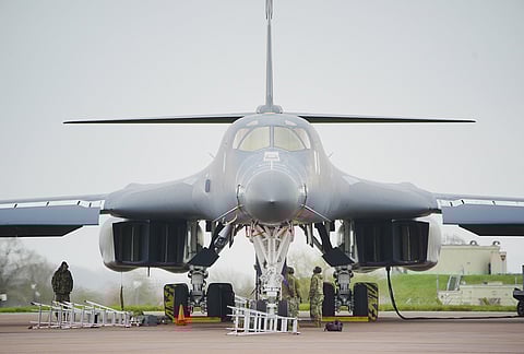 A US Air Force B-1 bomber is loaded with bombs at RAF Fairford in Gloucestershire, England.
