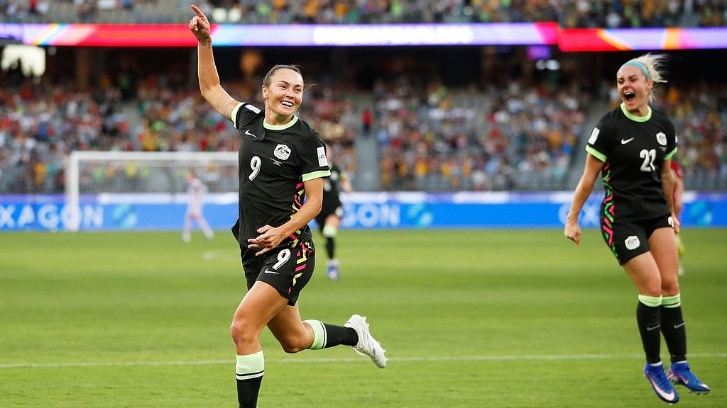 Australia's Caitlin Foord, left, celebrates after scoring her team's first goal during the Women's Asian Cup semi-final between China and Australia in Perth, Australia. - Photo: AP