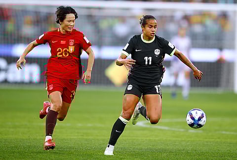 Australia's Mary Fowler, right, and China's Zhang Rui compete for the ball during the Women's Asian Cup semifinal soccer match between China and Australia in Perth, Australia.