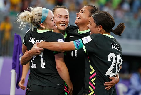 Australia's Caitlin Foord, second left, is congratulated by teammates after scoring her team's first goal during the Women's Asian Cup semifinal soccer match between China and Australia in Perth, Australia.
