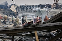 | Photo: AP/Siddiqullah Alizai : Residents and rescue workers inspect the site of a late-Monday airstrike at a drug rehabilitation hospital in Kabul, Afghanistan.