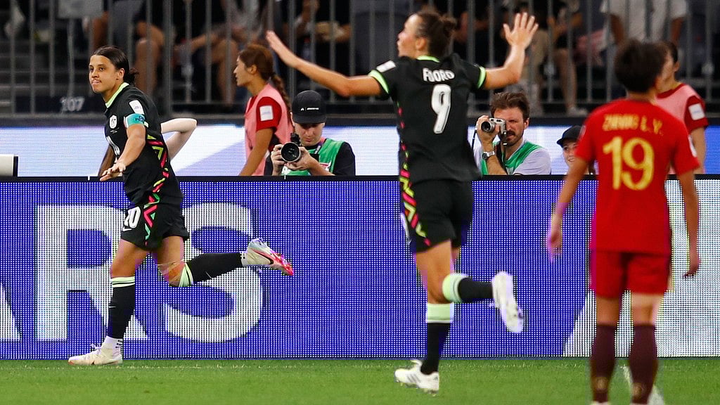 Australia's Sam Kerr, left, reacts after scoring her team's second goal during the Women's Asian Cup semi-final between China and Australia in Perth. - Photo: AP